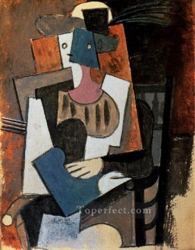 パブロ・ピカソ Painting - 肘掛け椅子に座る羽のついた帽子をかぶった女性 1919 年キュビスト パブロ・ピカソ